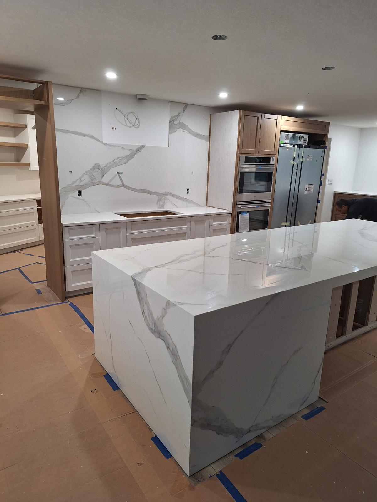 Kitchen with a white quartz island