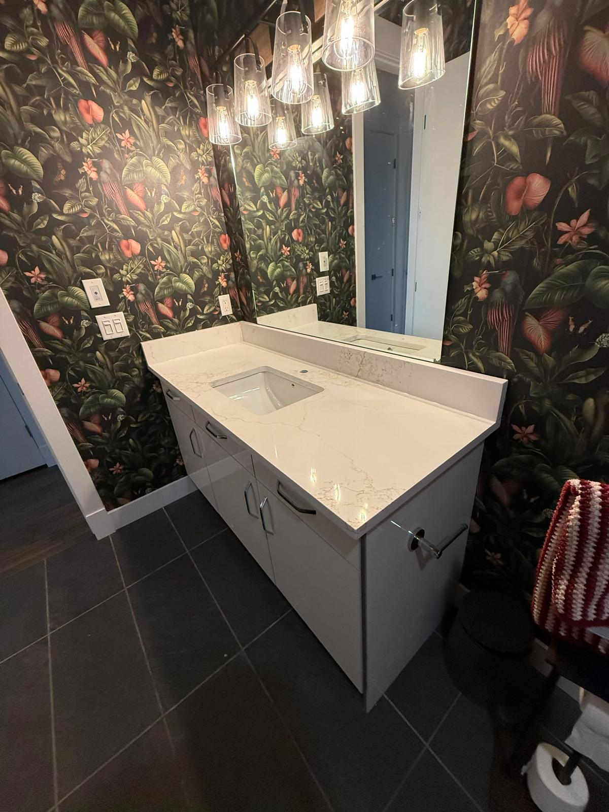 Bathroom single vanity with stone countertop and undermount sink