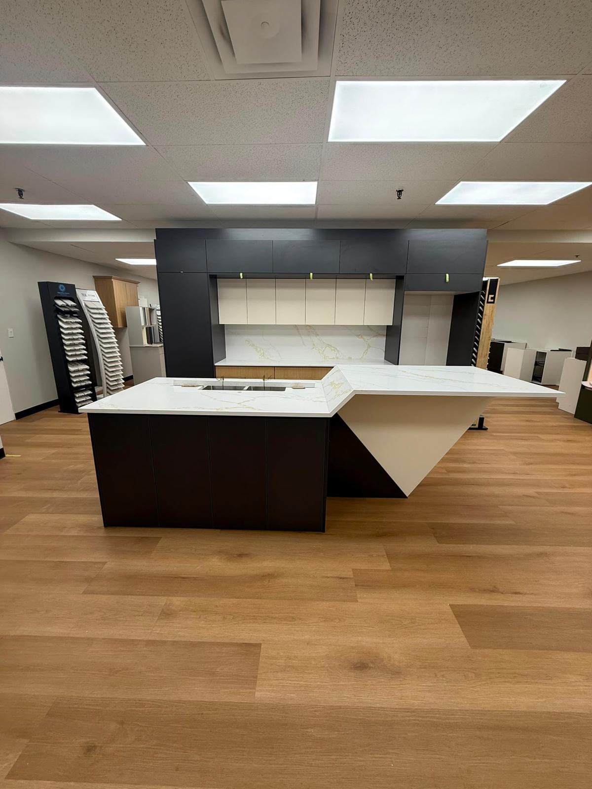 Front view of an office kitchen stone island