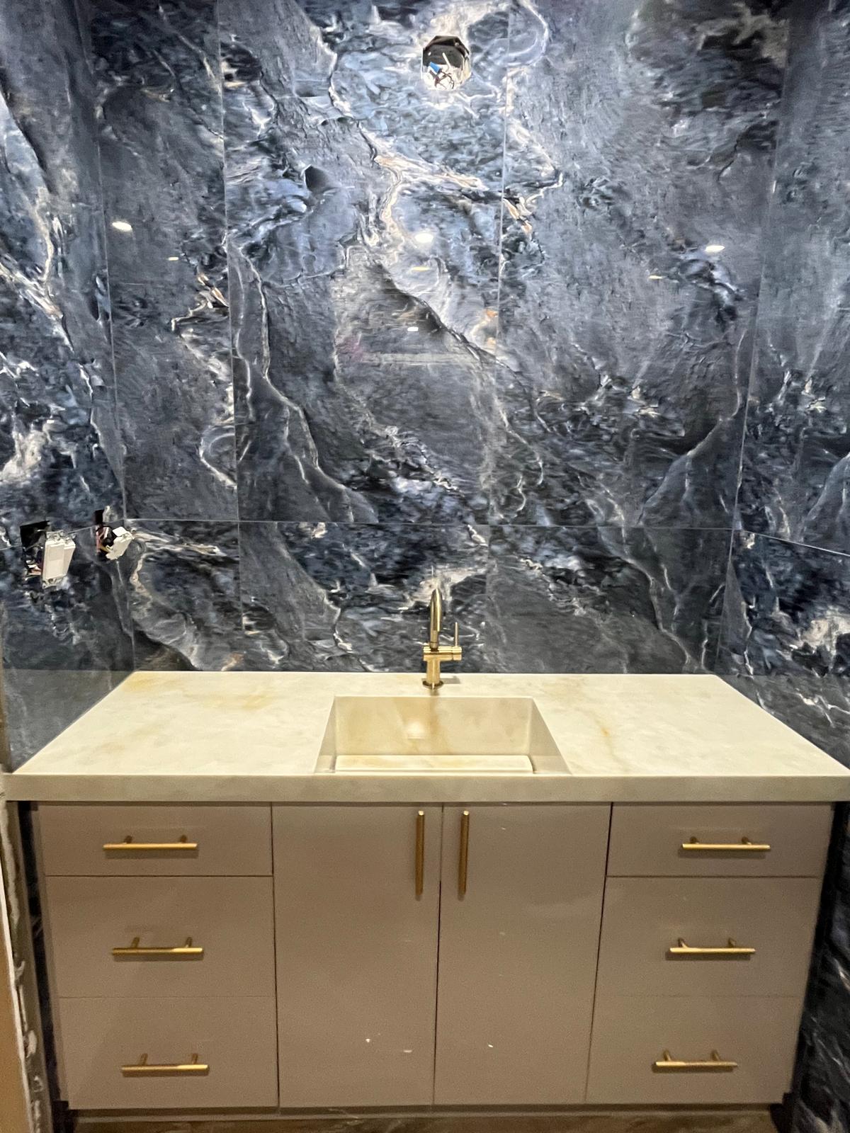 Master bathroom vanity with stone countertop
